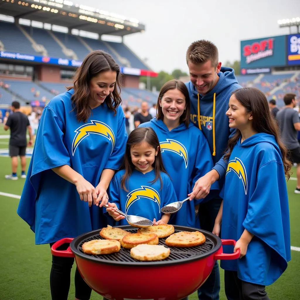 Family wearing Chargers ponchos at a tailgate party