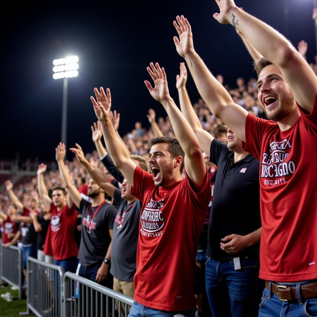 Chisholm Football Fans Celebrating a Touchdown