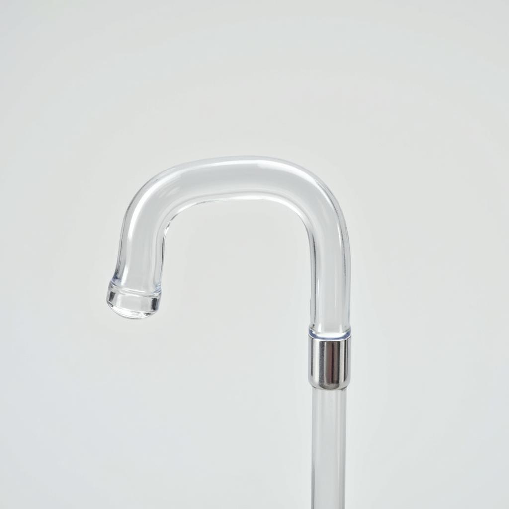 Close-up of a clear cane highlighting its transparency and modern design