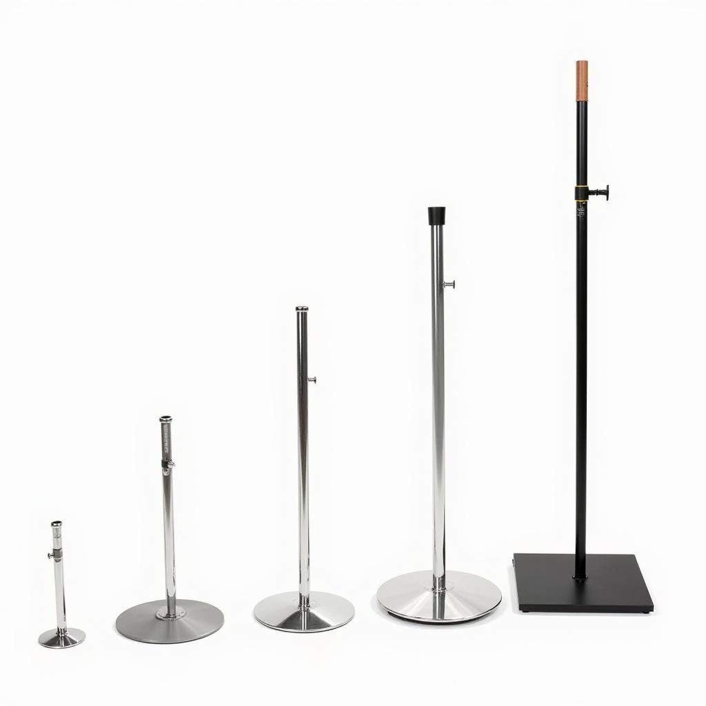 A variety of portable umbrella stands with different base types and sizes.