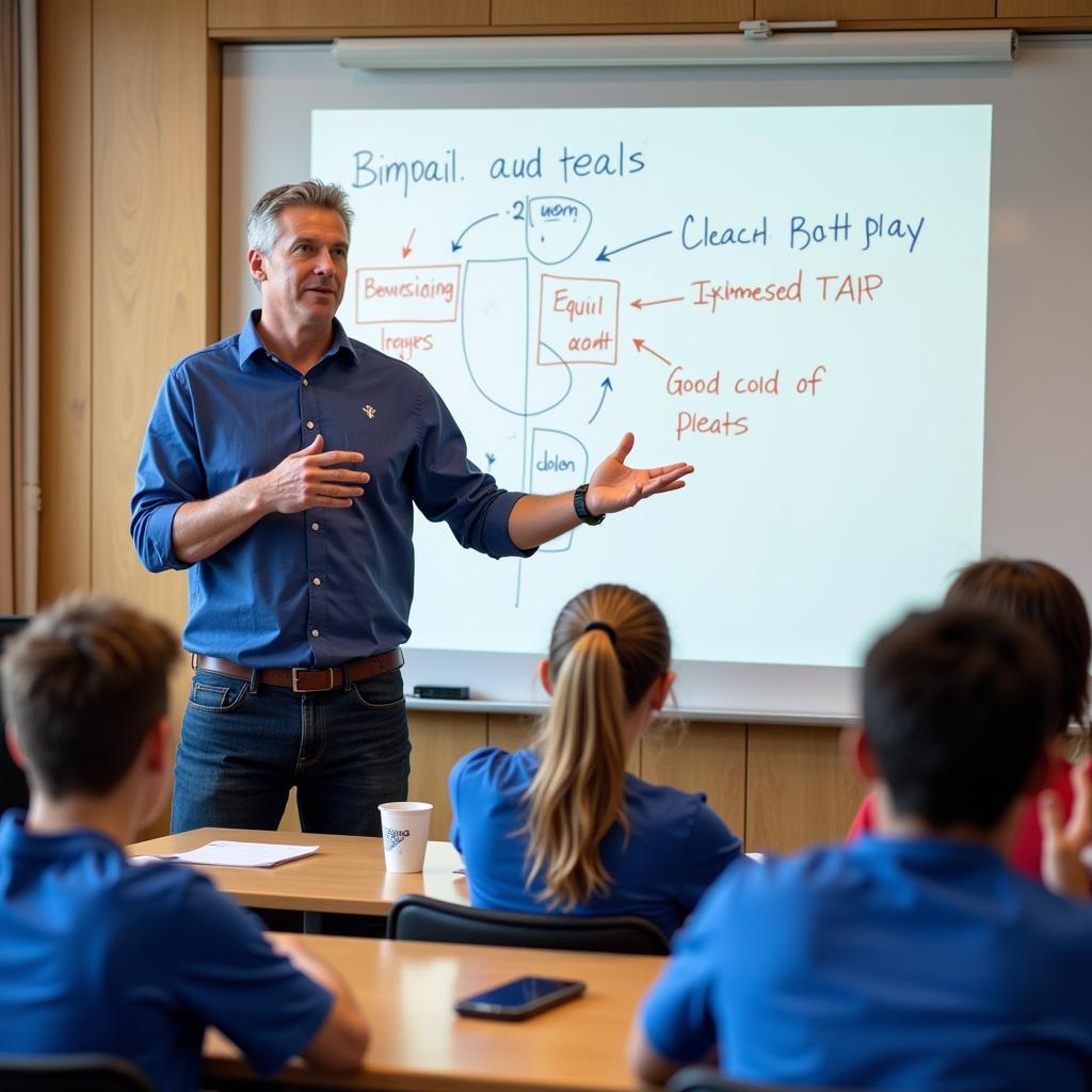 A football coach demonstrating the use of handheld signs to his team