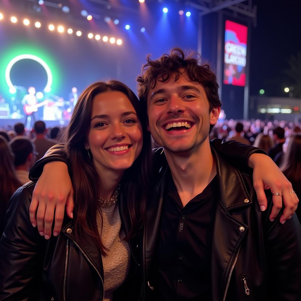 Couple holding hands at a Green Day concert