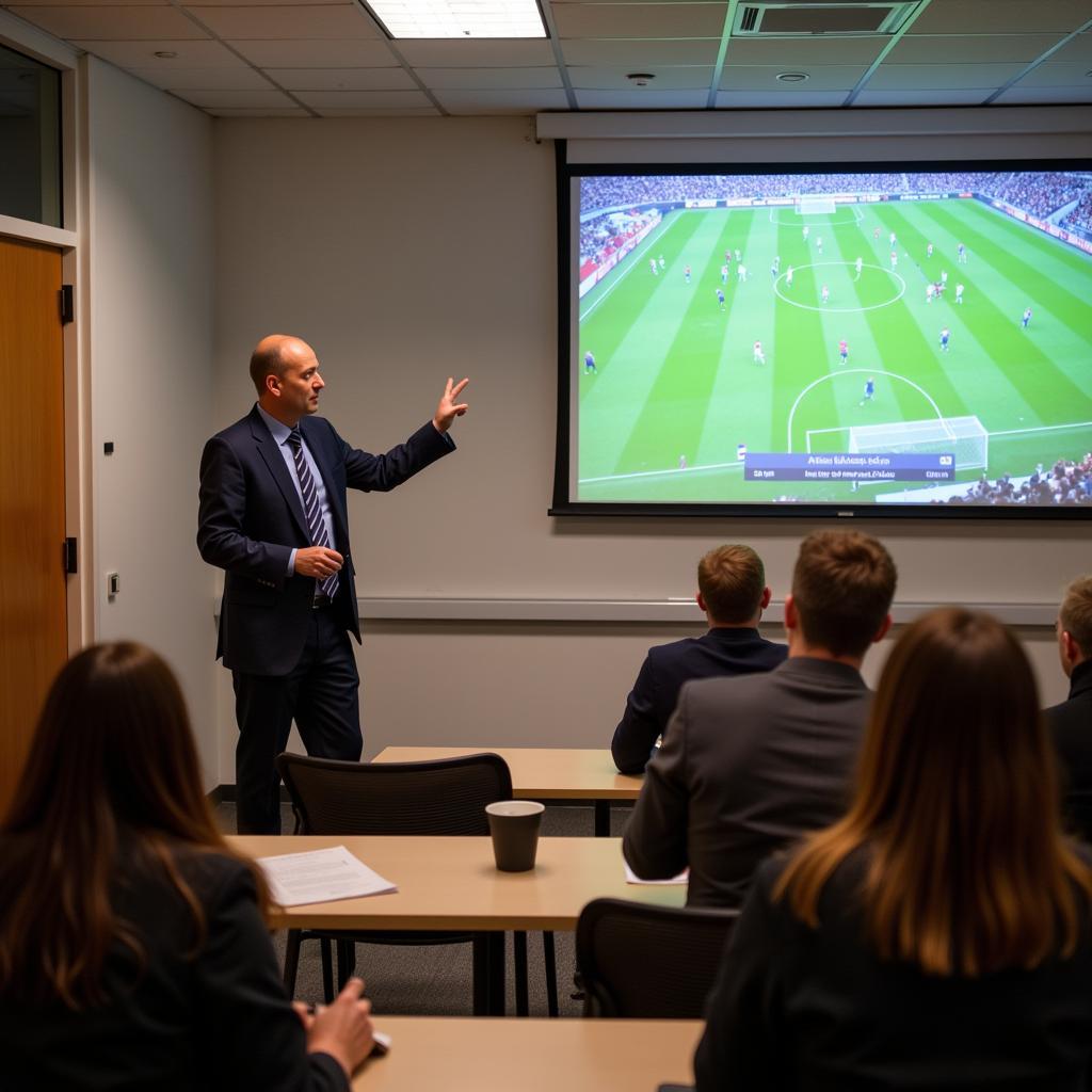 Gregory Andrus Leading a Football Seminar