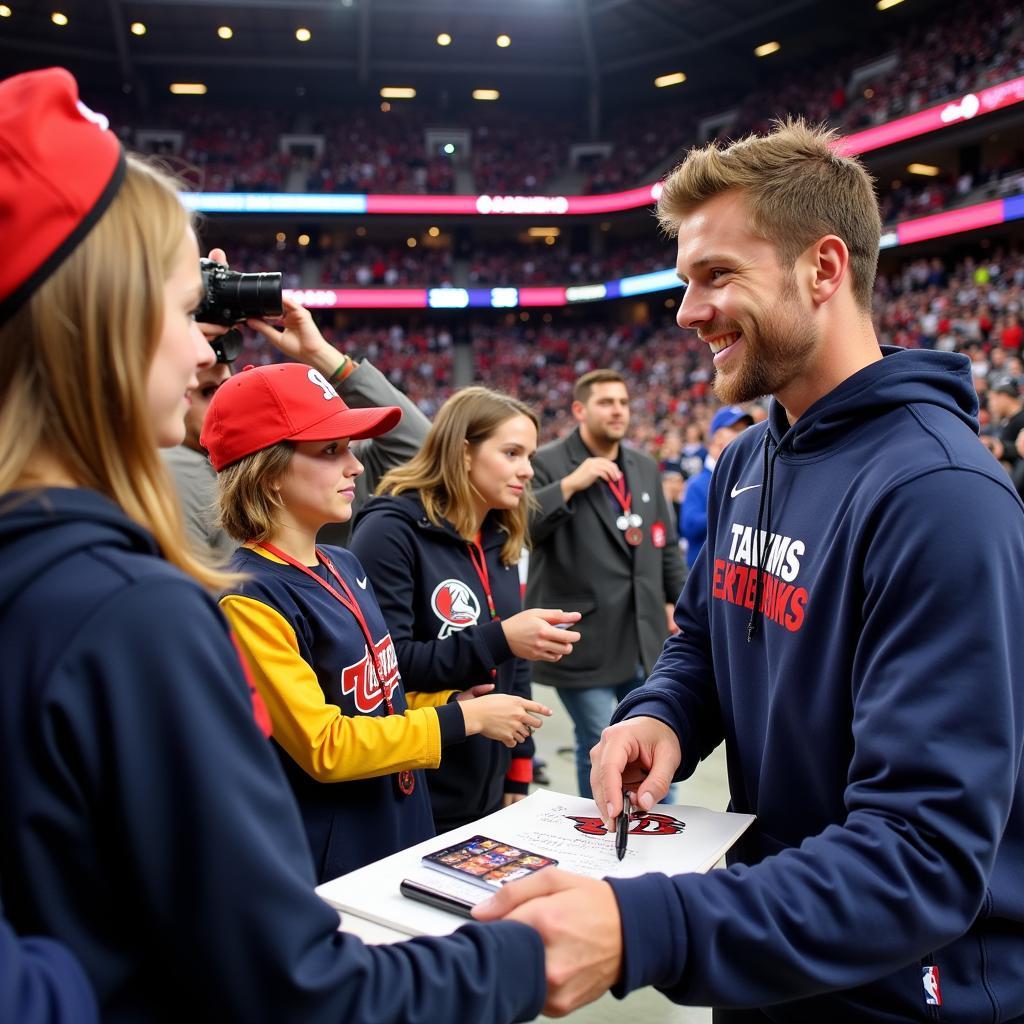 Gunnar Henderson signing autographs for fans