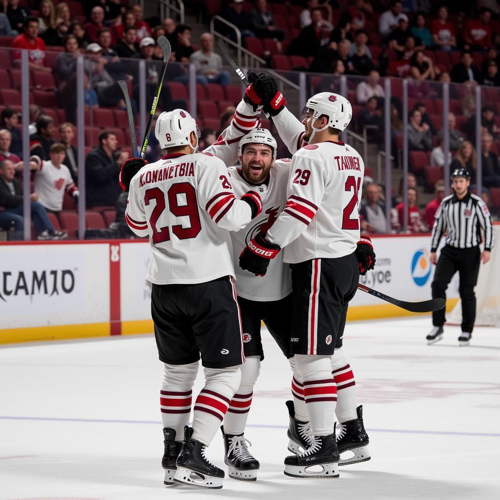 Jacob Tanner celebrating a goal with his teammates