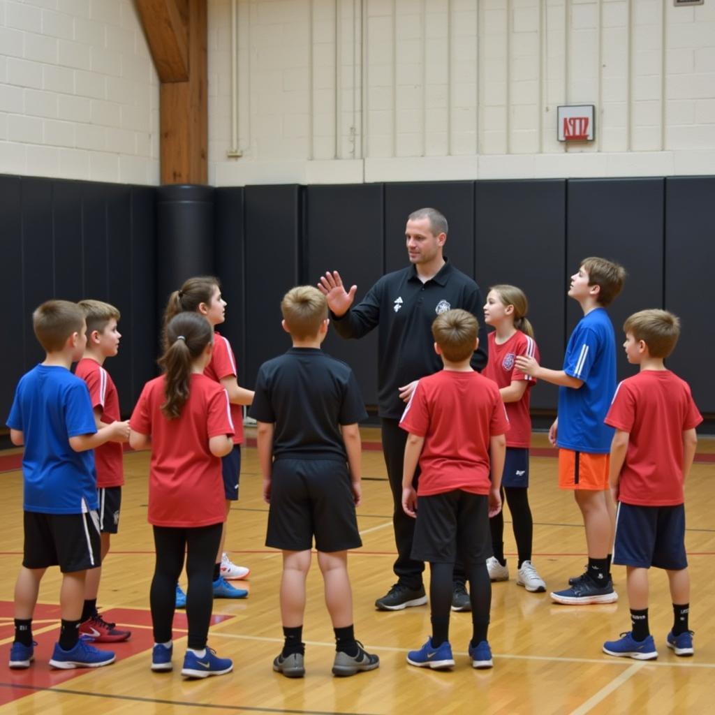 Jeremy Otto coaching young footballers