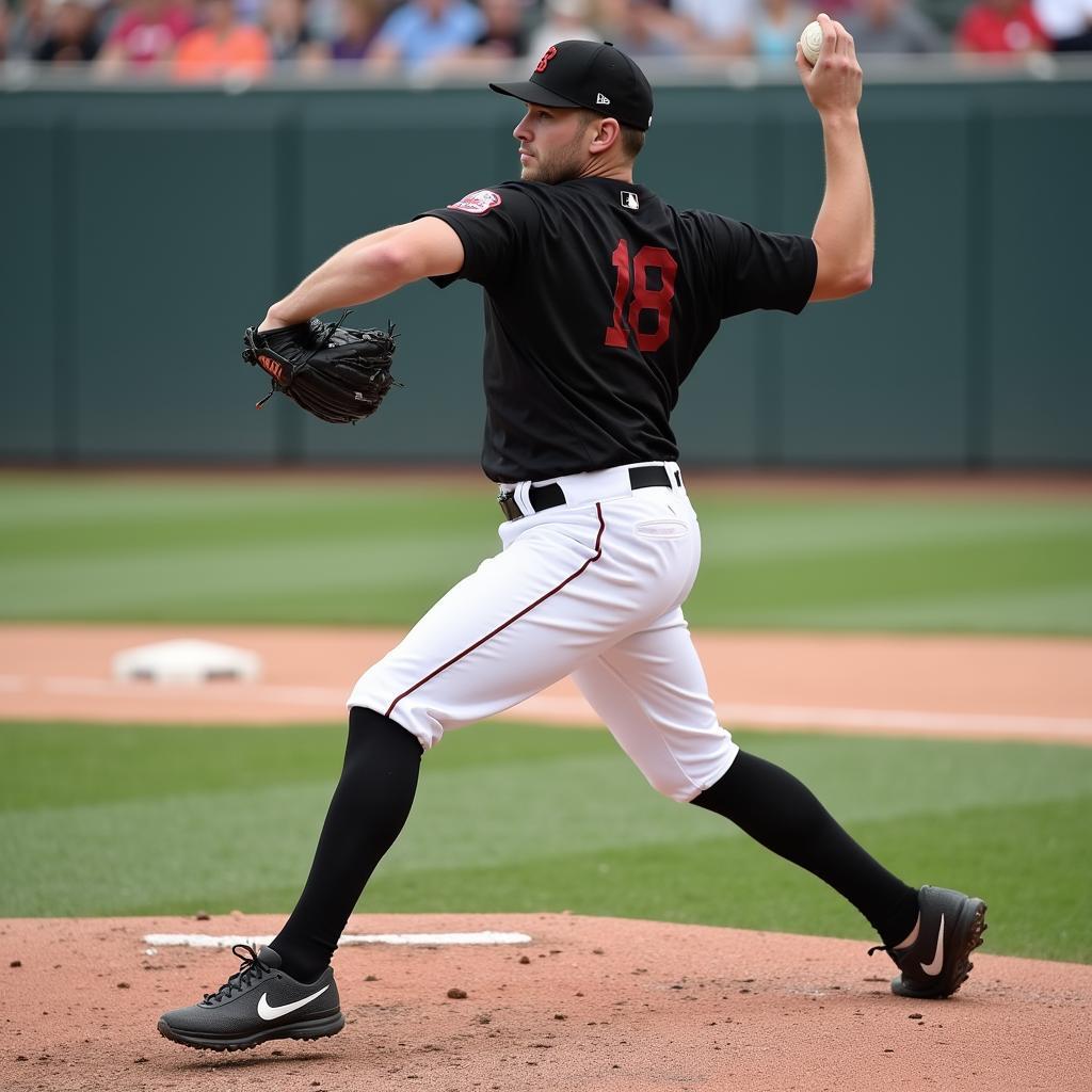 Baseball player wearing knee high baseball pants during a game