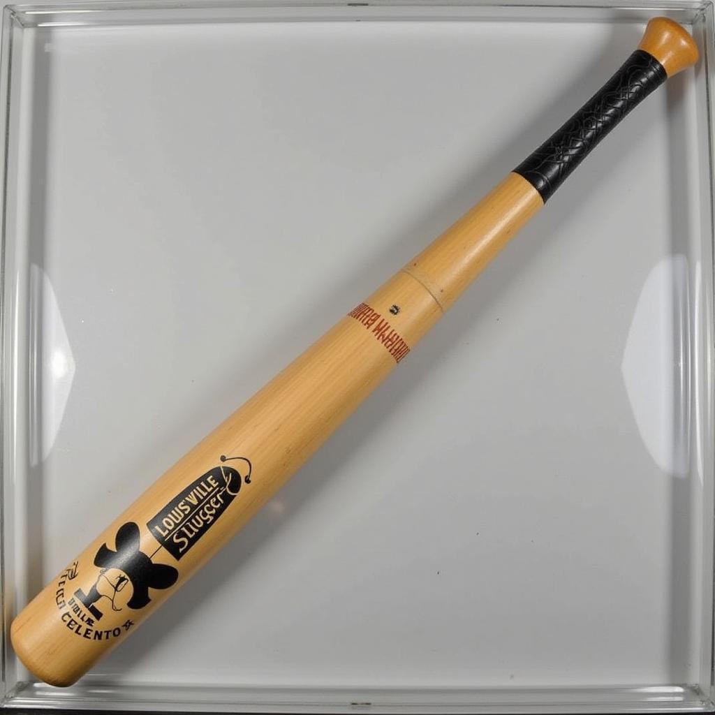 Louisville Slugger Mickey Mantle bat displayed in a glass case