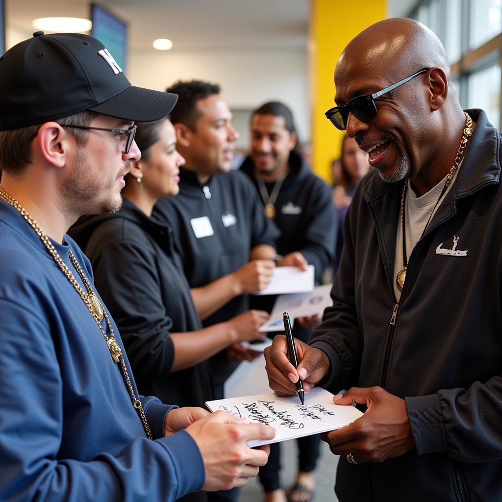 Mickey Rivers Signing Autographs for Fans