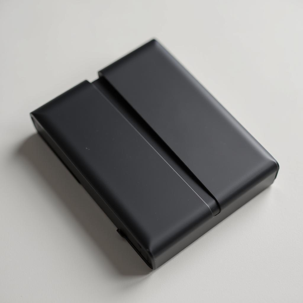 Modern slim metal cigarette case in matte black finish