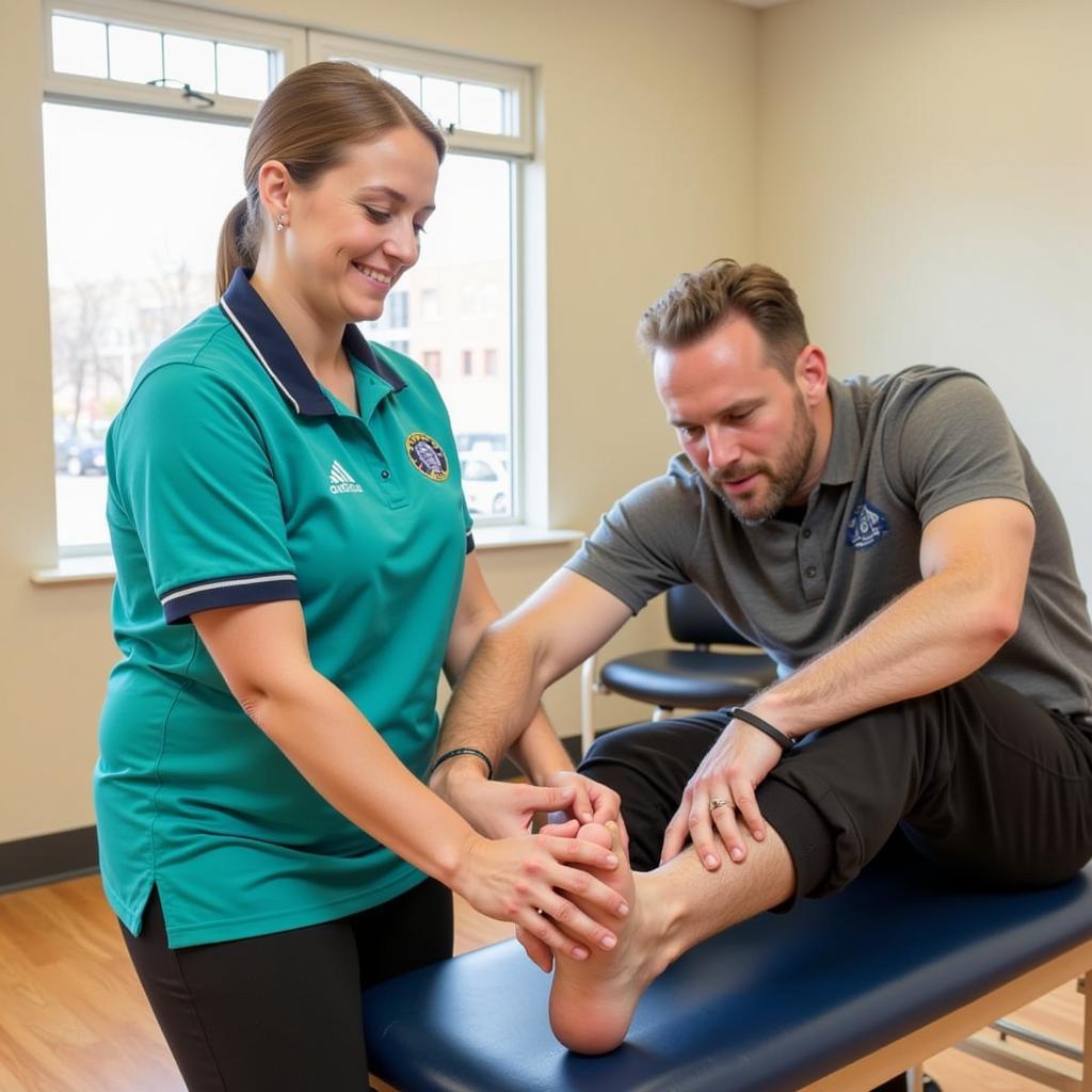 Physical therapist guiding a patient through exercises at a shoemaker rehab center