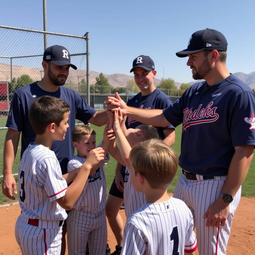 Reno Mustangs players leading a youth baseball clinic