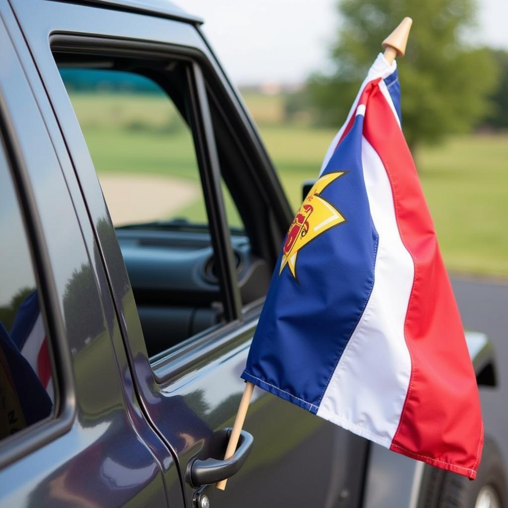 Stick on flag holder applied to a car window