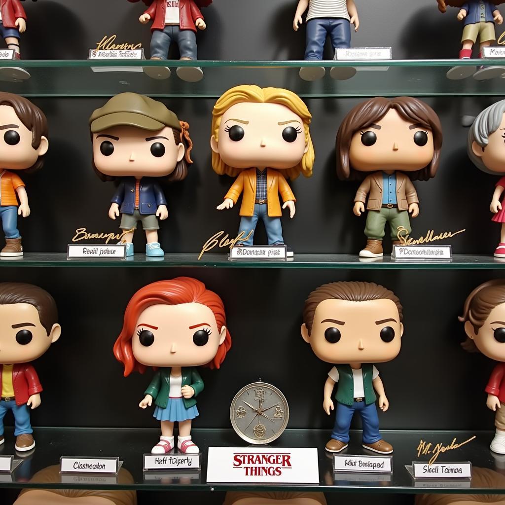 Display Case with Autographed Stranger Things Funko Pops