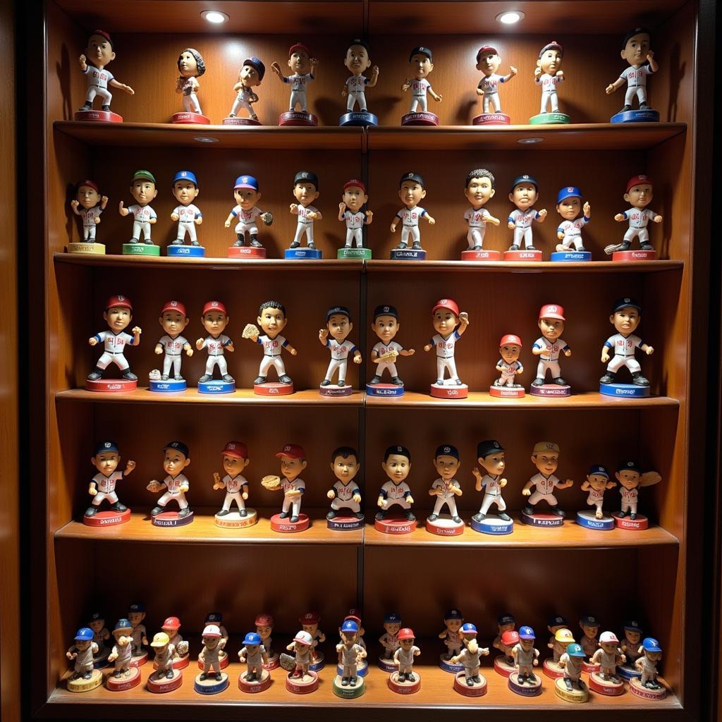 A collection of Valenzuela bobbleheads proudly displayed on a shelf