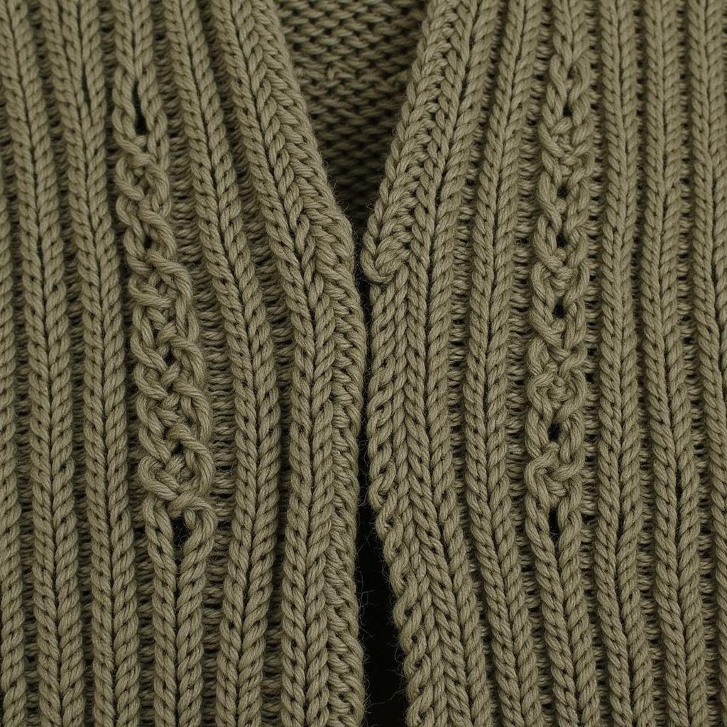 Close-up view of the intricate knitting of a vintage military sweater