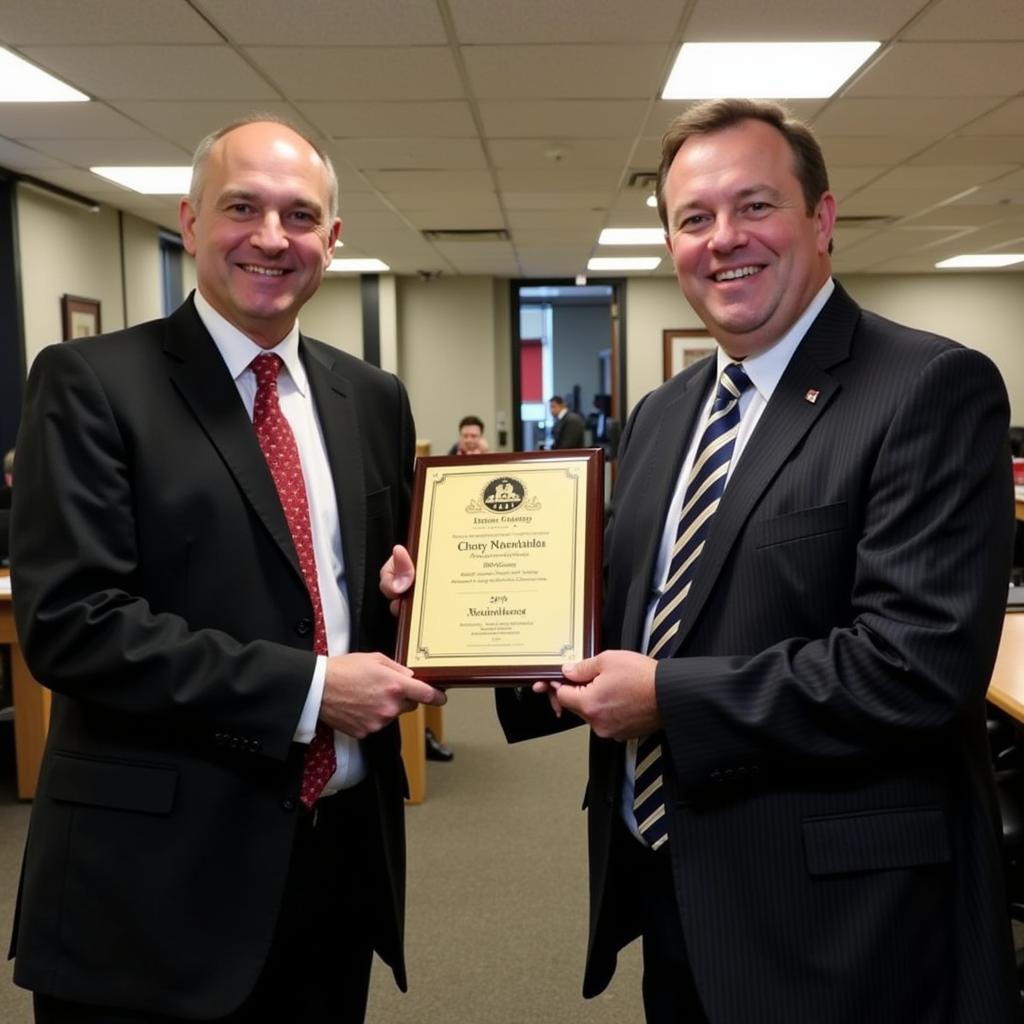 Presenting a 20th Anniversary Plaque in a Corporate Setting