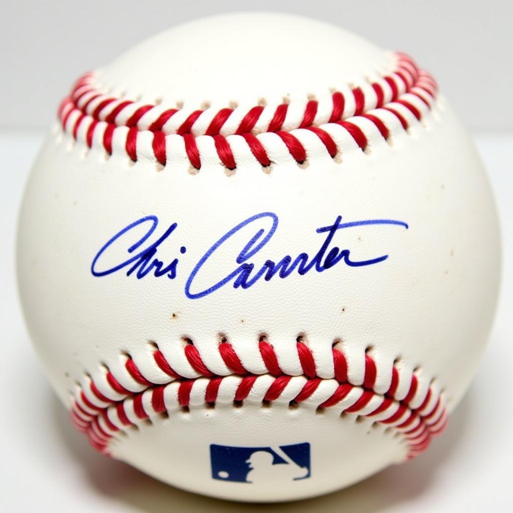 Close-up of a Chris Carpenter signed baseball, showcasing the signature's detail and the official MLB logo.