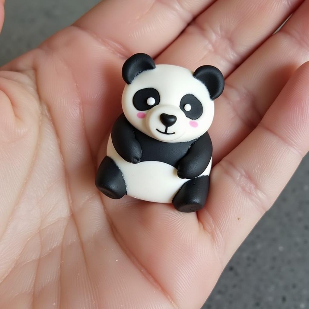 Detailed View of a Handcrafted Panda Bear Pin