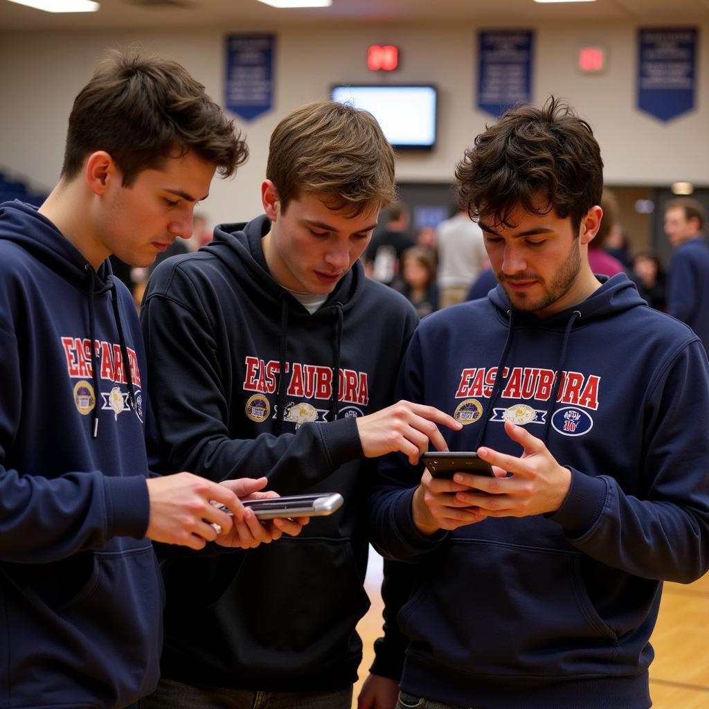 East Aurora Basketball Fans Checking the Schedule