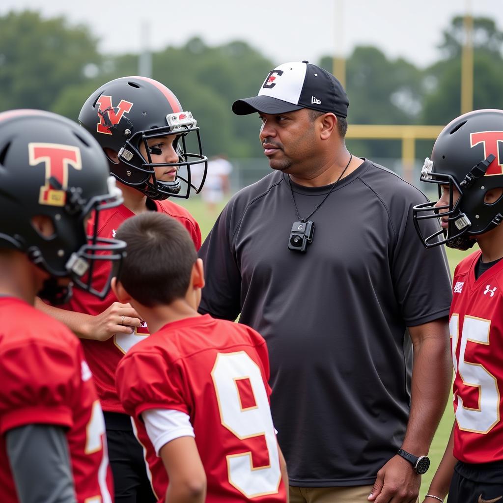 Football Coach Mentoring Players in Florence, AL