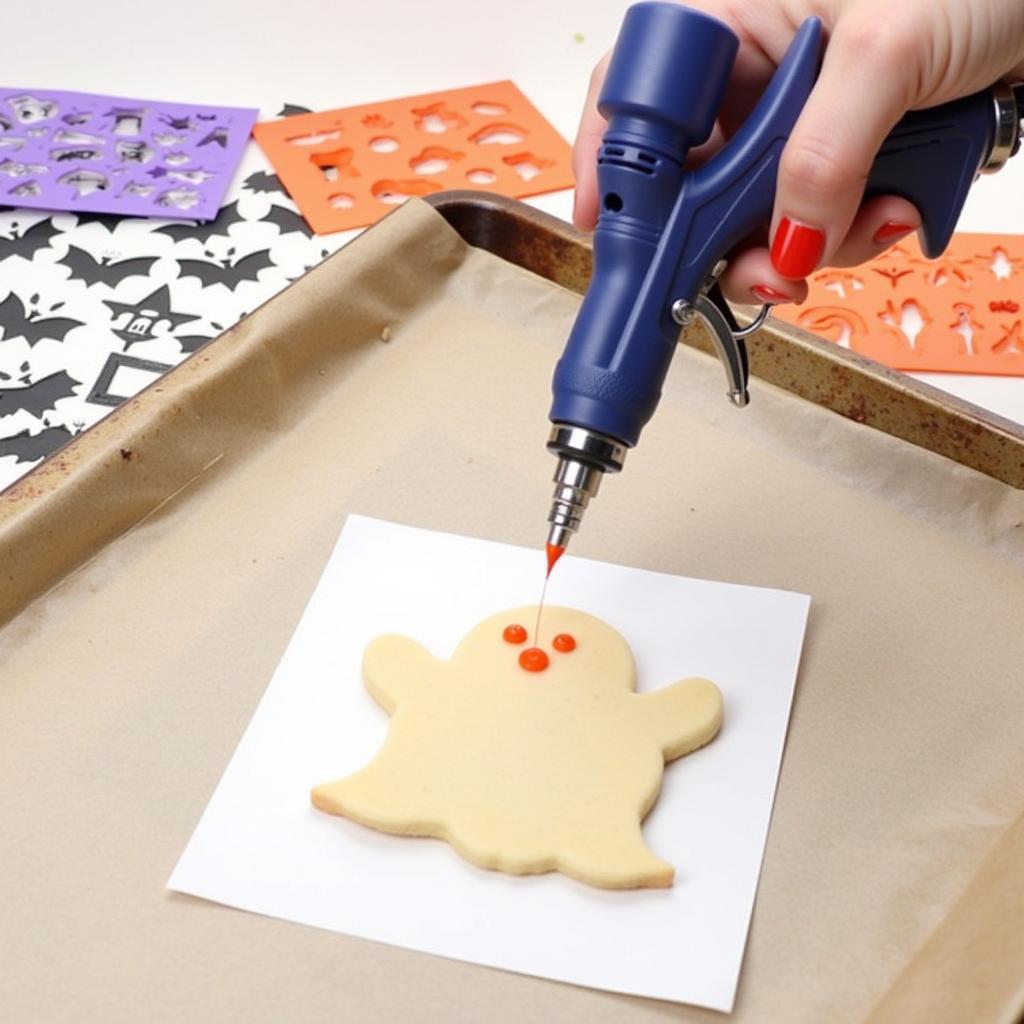 Airbrushing technique with Halloween cookie stencils