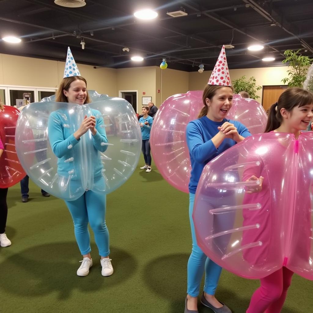 A group of friends celebrating a birthday with bubble ball in Houston.