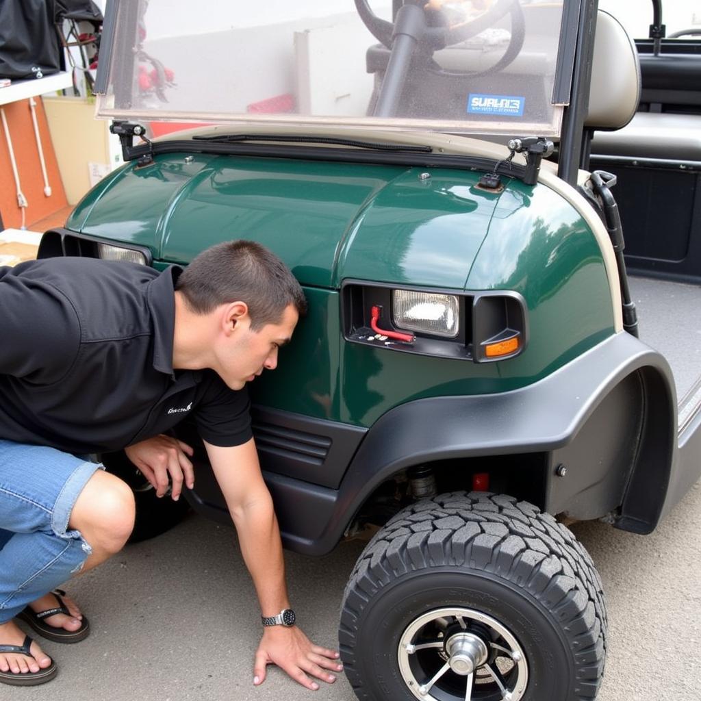 Inspecting Used Golf Cart in St. Louis