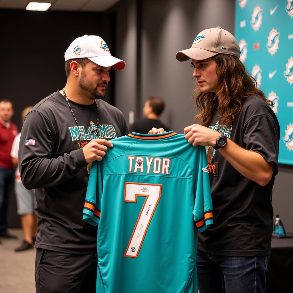 Jason Taylor Signing Jerseys at an Autograph Event