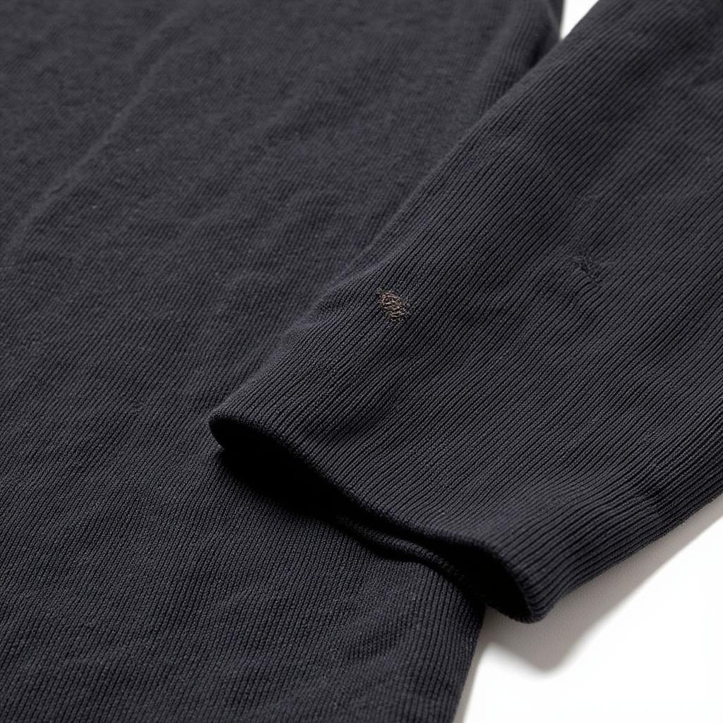 Close-up view of the soft, premium fabric used in a Jordan 8 Sweater