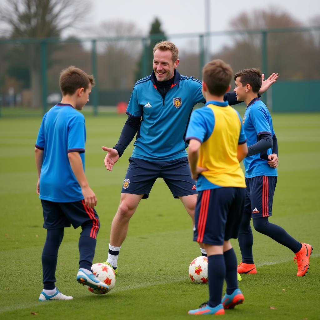 Kevin Matheson Mentoring Young Football Players