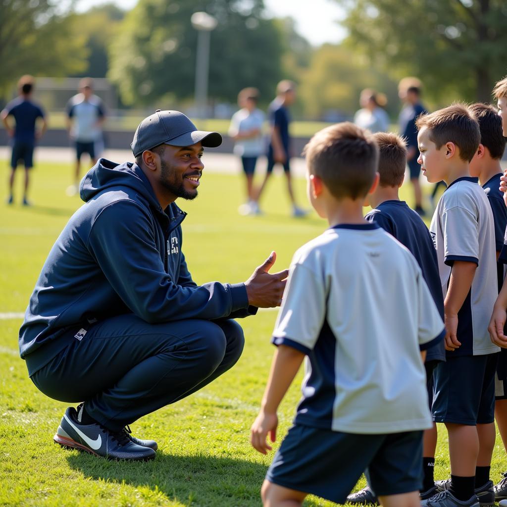 Larry Tolbert coaching youth football