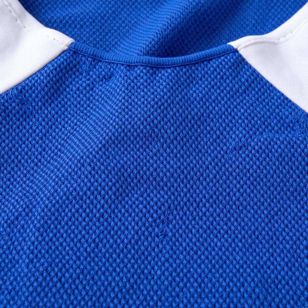 Close-up view of a mesh hockey jersey fabric