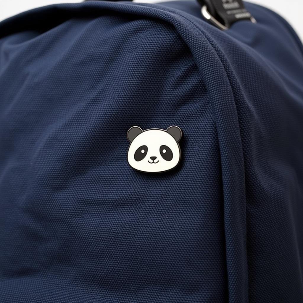 Panda Bear Pin Attached to a Backpack