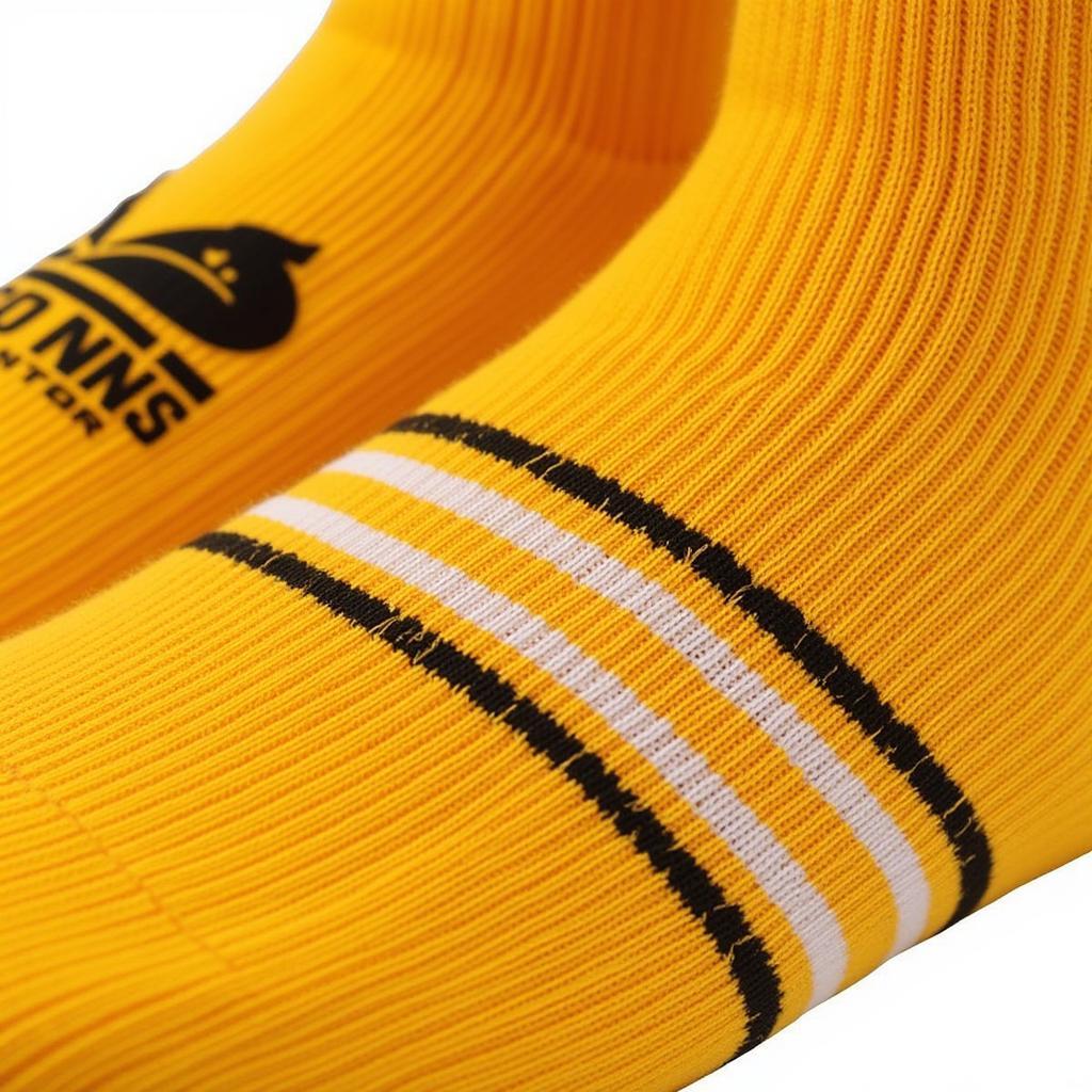 Close-up view of vegas gold baseball socks highlighting the material and texture.