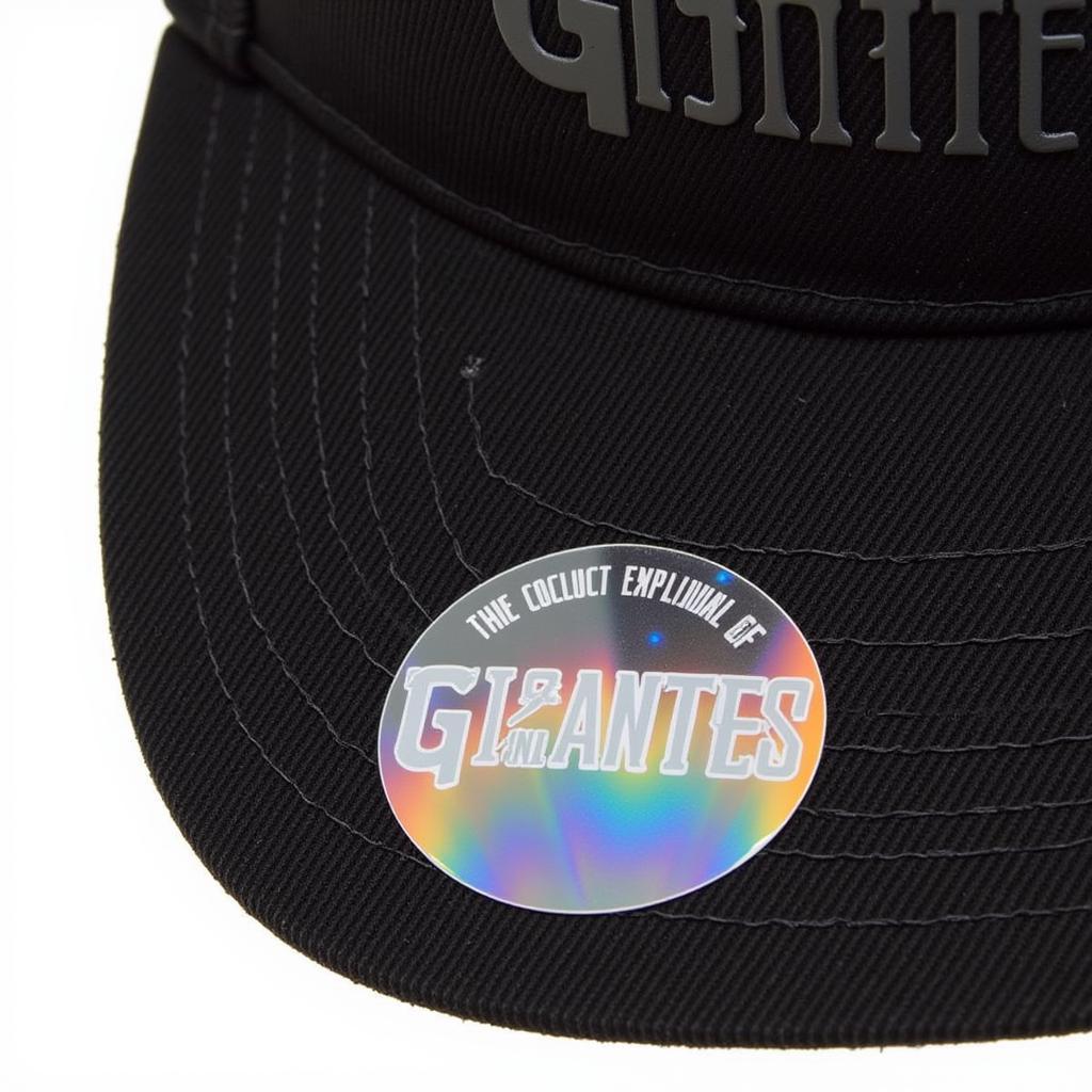 An authentic Gigantes hat displaying a holographic sticker as proof of authenticity