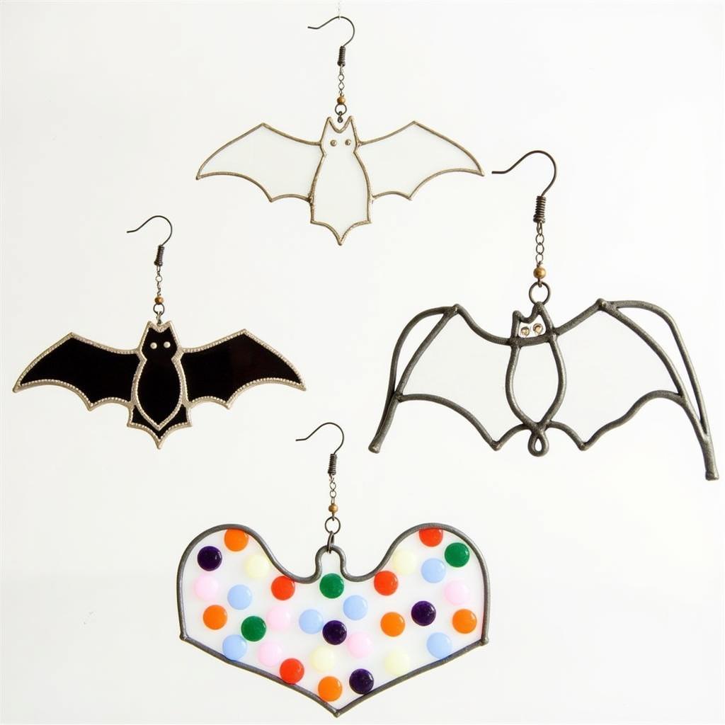 Different styles of bat sun catchers made from various materials like stained glass, acrylic, and metal.