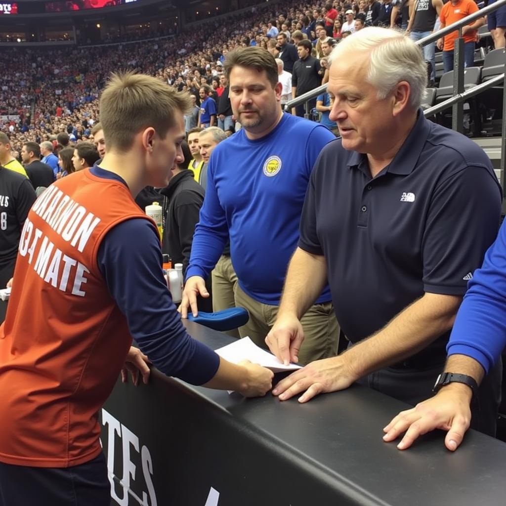 George Kirby signing autographs for fans