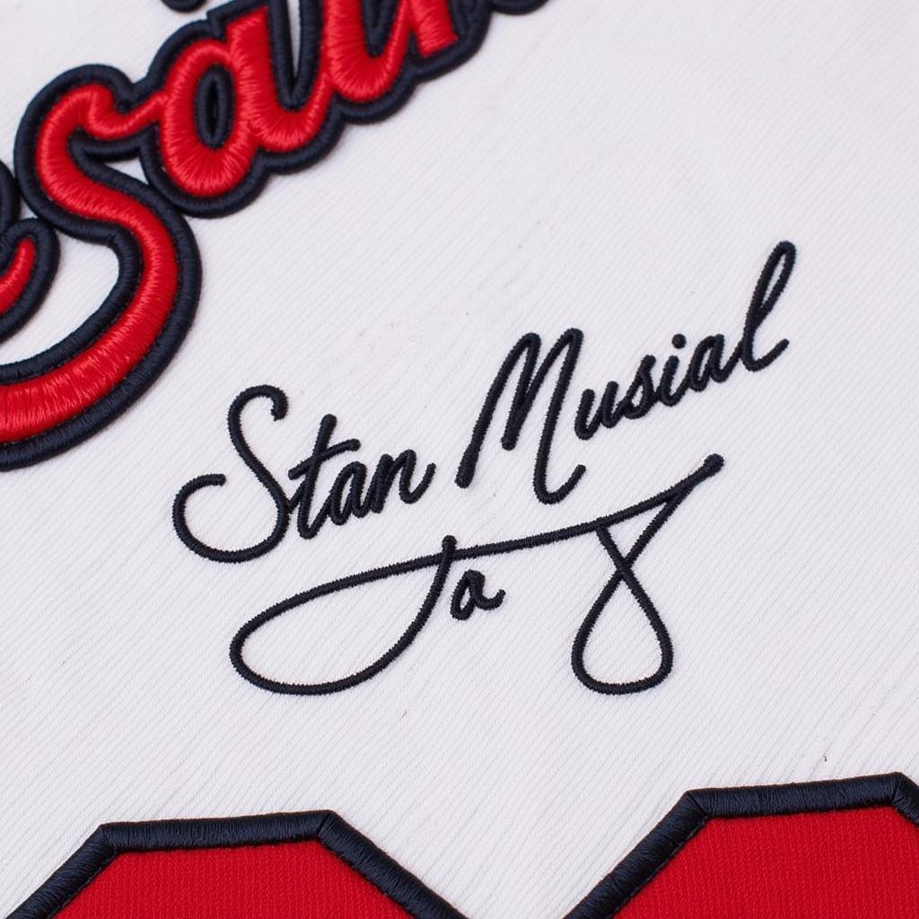 Close-up of Stan Musial's signature on a jersey