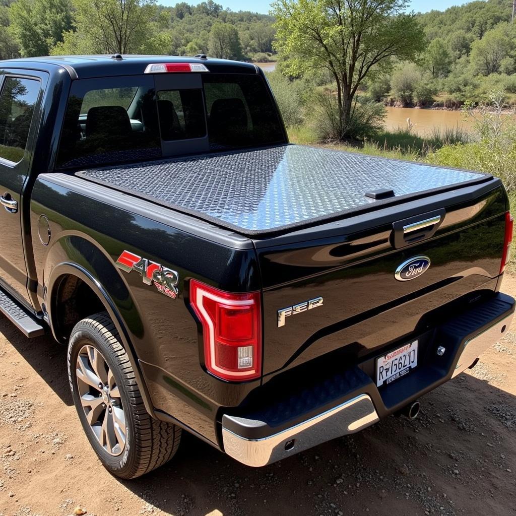 A pickup truck with a diamond plate tailgate cover, showcasing the rugged and stylish look it provides