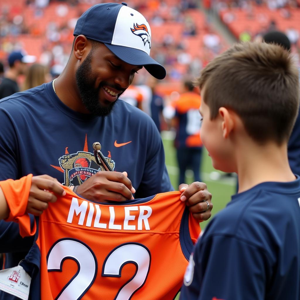 Von Miller signing a Denver Broncos jersey for a fan.